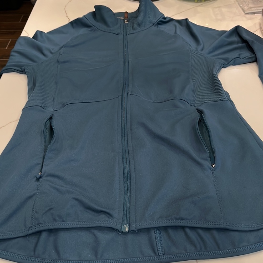 Champion Athlete light weight women jacket. Beautiful color of Blue/green. Med